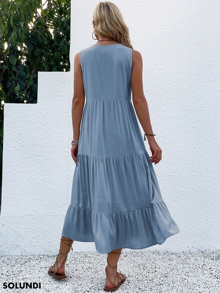 Heidi – midimittainen röyhelömekko napituksella edessä