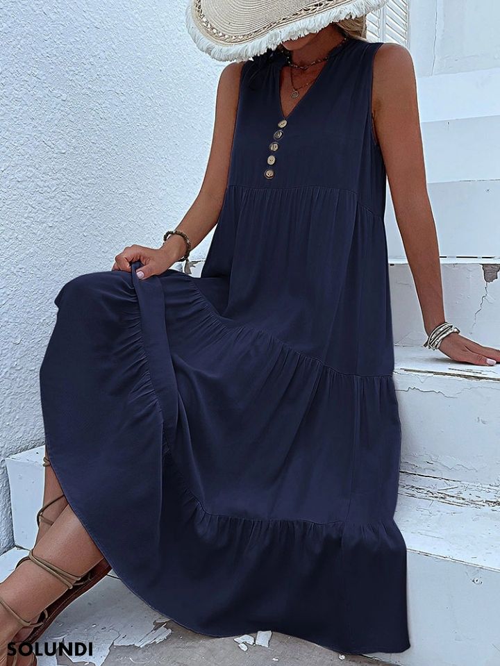 Heidi – midimittainen röyhelömekko napituksella edessä