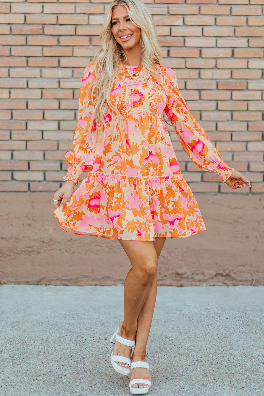 Elegant orange flared mini dress with smocked lantern sleeves for women