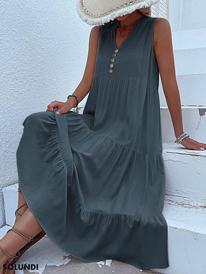 Heidi – midimittainen röyhelömekko napituksella edessä