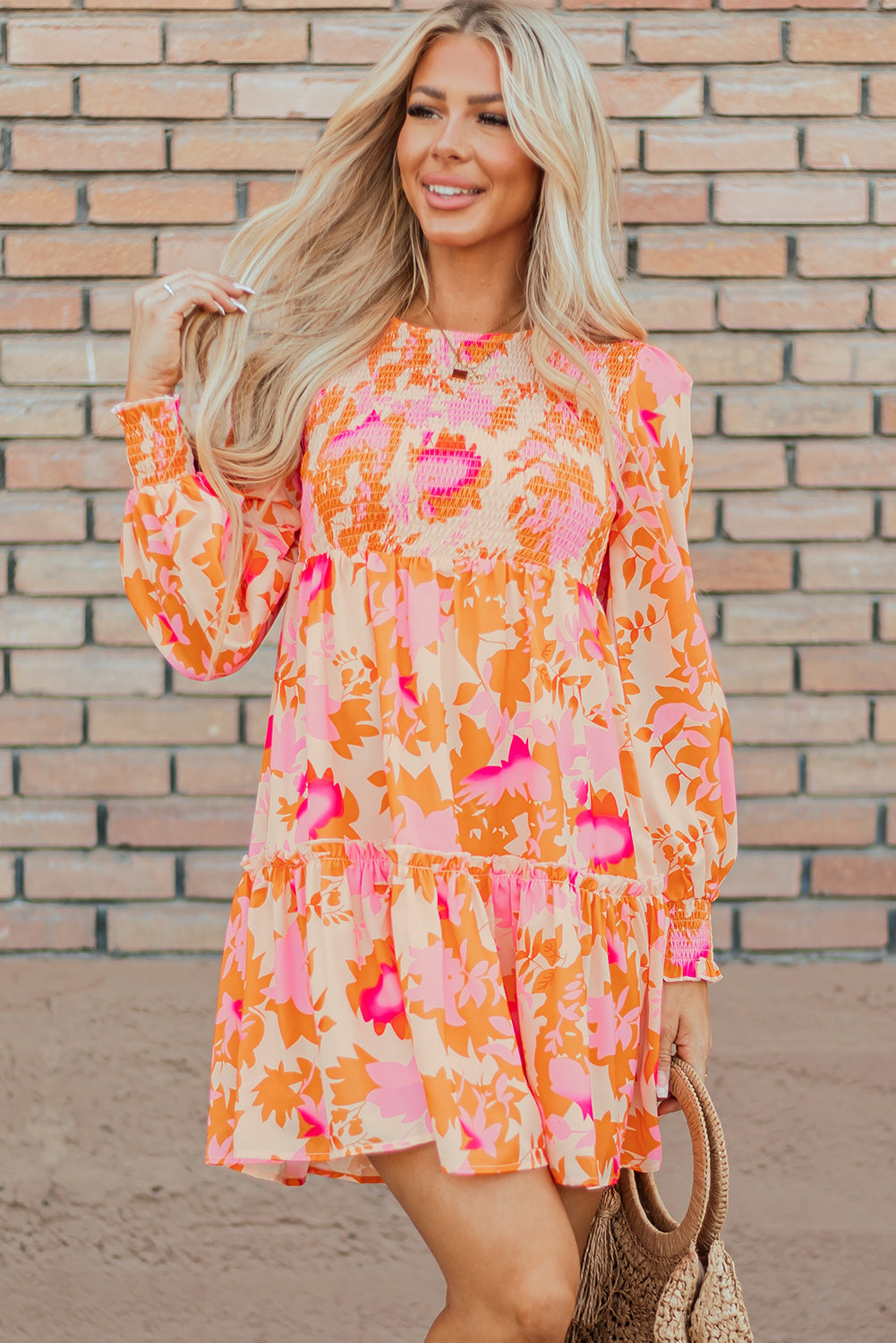 Elegant orange flared mini dress with smocked lantern sleeves for women