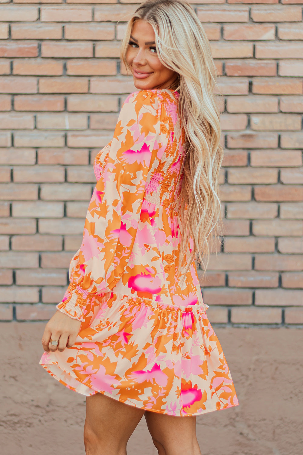 Elegant orange flared mini dress with smocked lantern sleeves for women