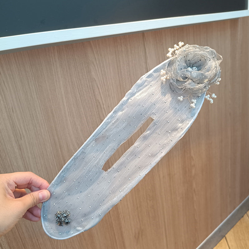 Bloomelle – elegantné kvetinové ozdoby na uzol do vlasov