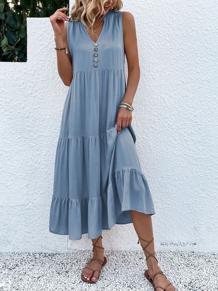 Heidi – midimittainen röyhelömekko napituksella edessä