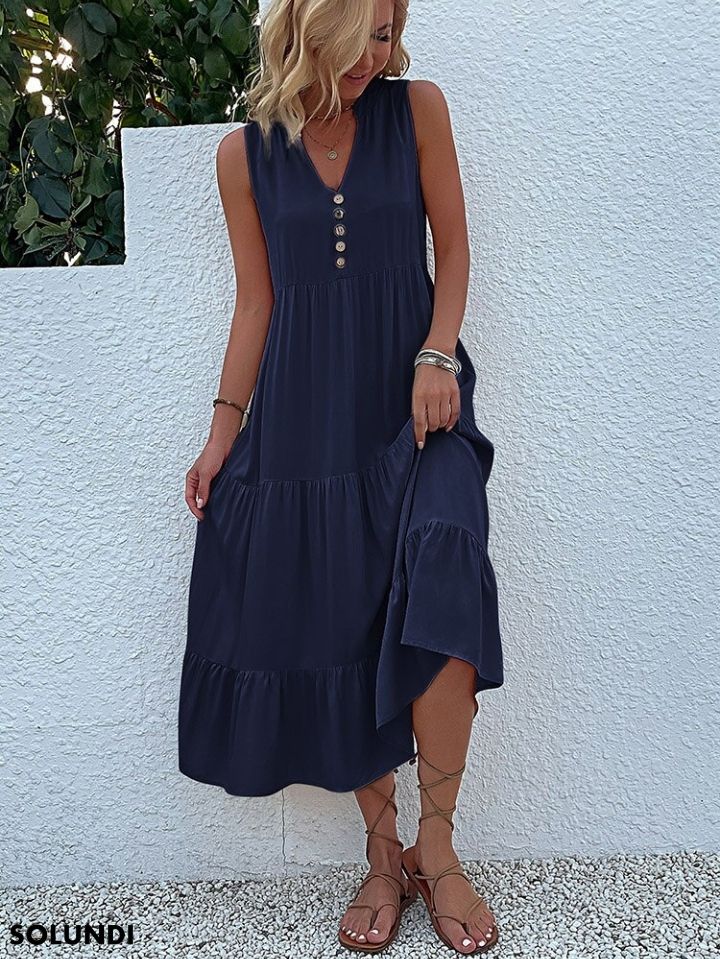 Heidi – midimittainen röyhelömekko napituksella edessä