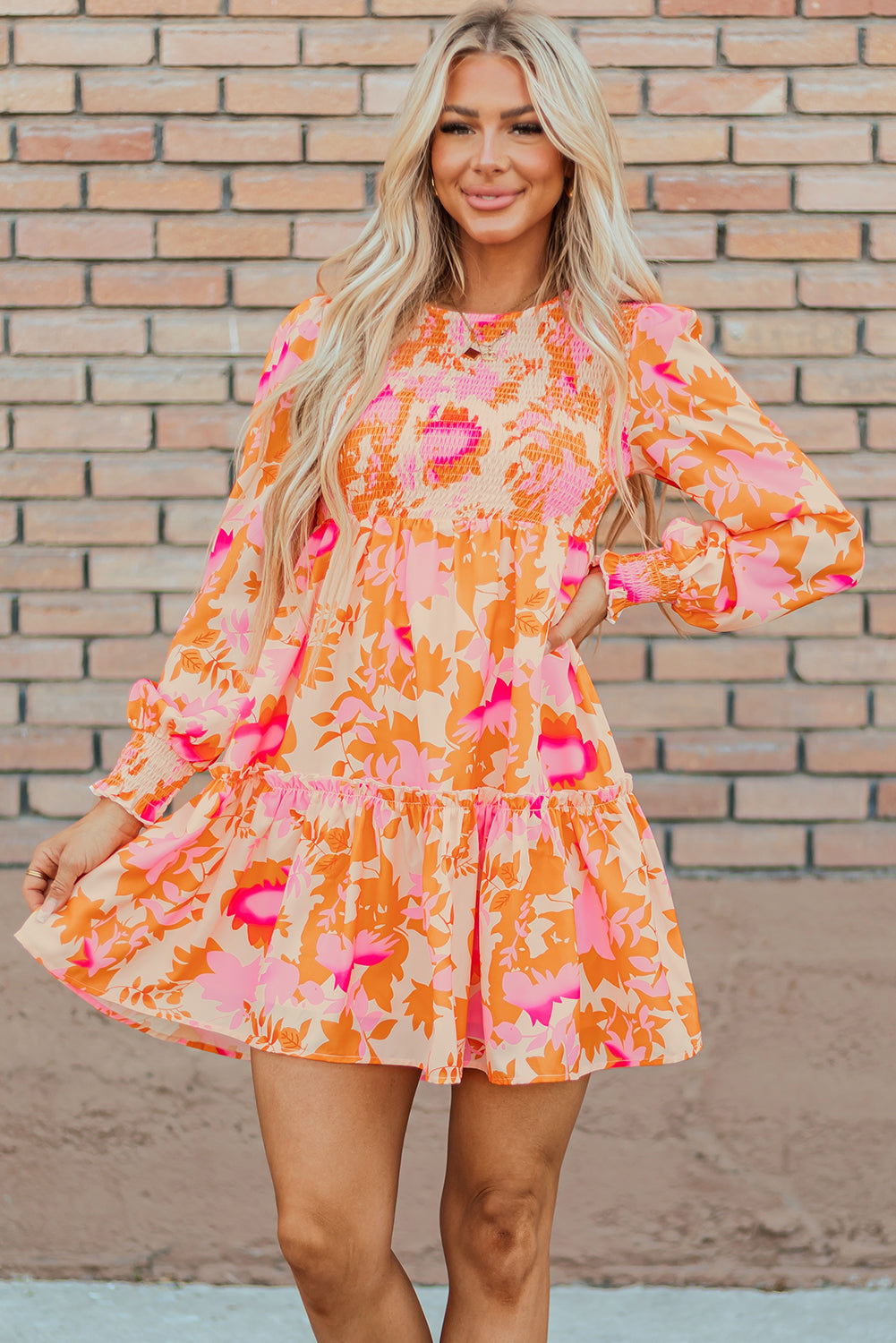 Elegant orange flared mini dress with smocked lantern sleeves for women