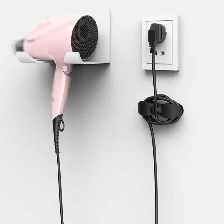 Samoprzylepny uchwyt porządkujący przewody do biurka