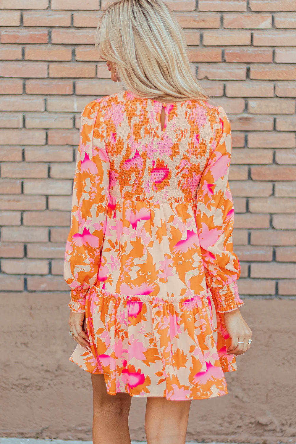 Elegant orange flared mini dress with smocked lantern sleeves for women