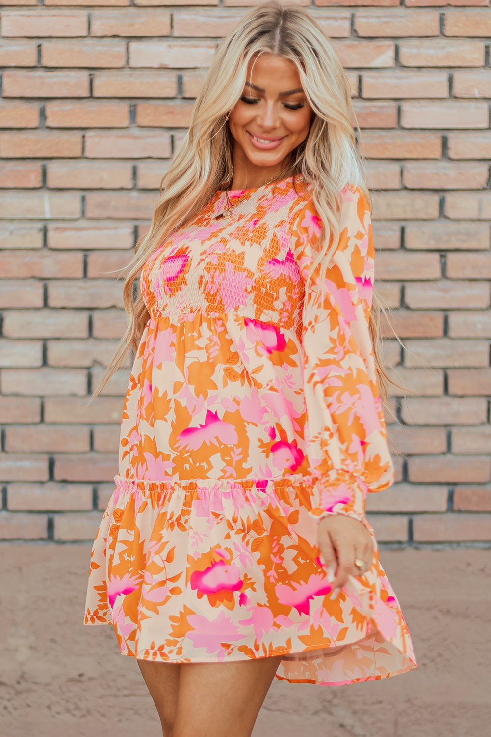 Elegant orange flared mini dress with smocked lantern sleeves for women