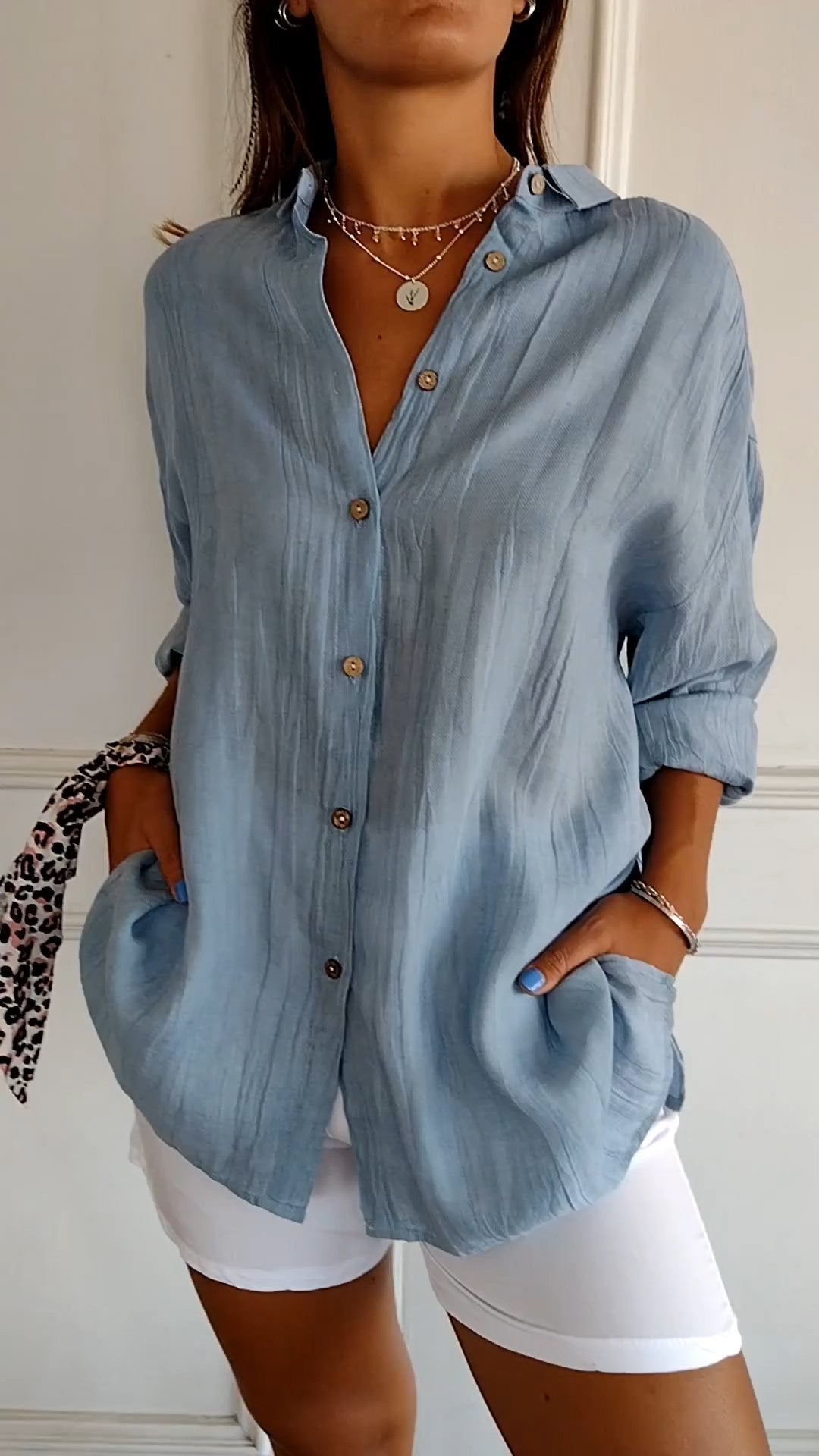 Chic women's blouse with pleated details and a light cut